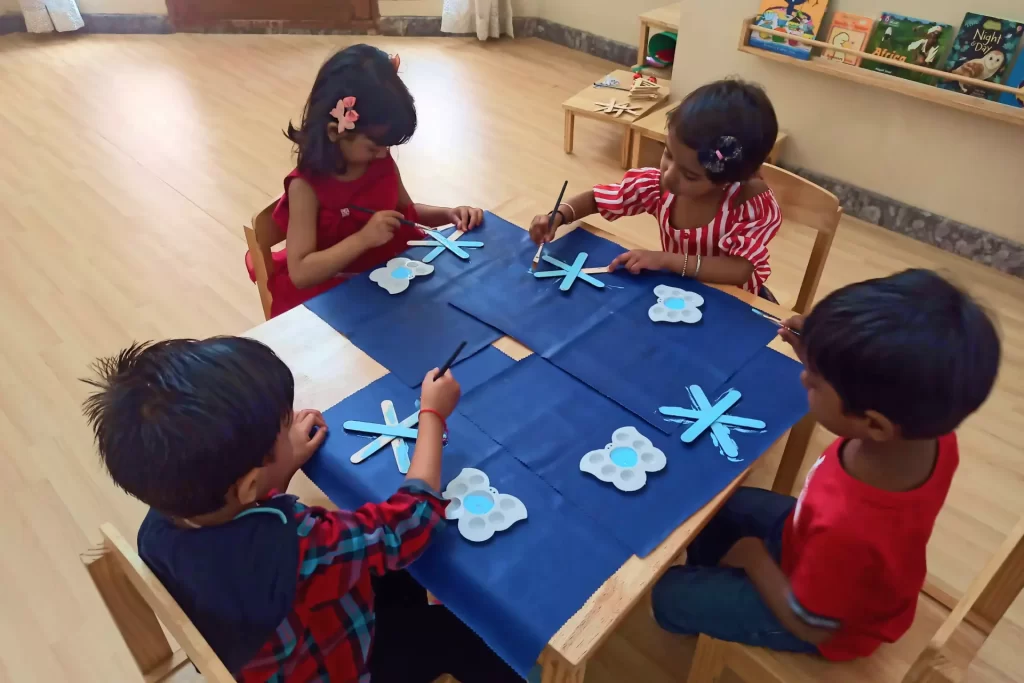 Children making snowflakes, Christmas activity for children